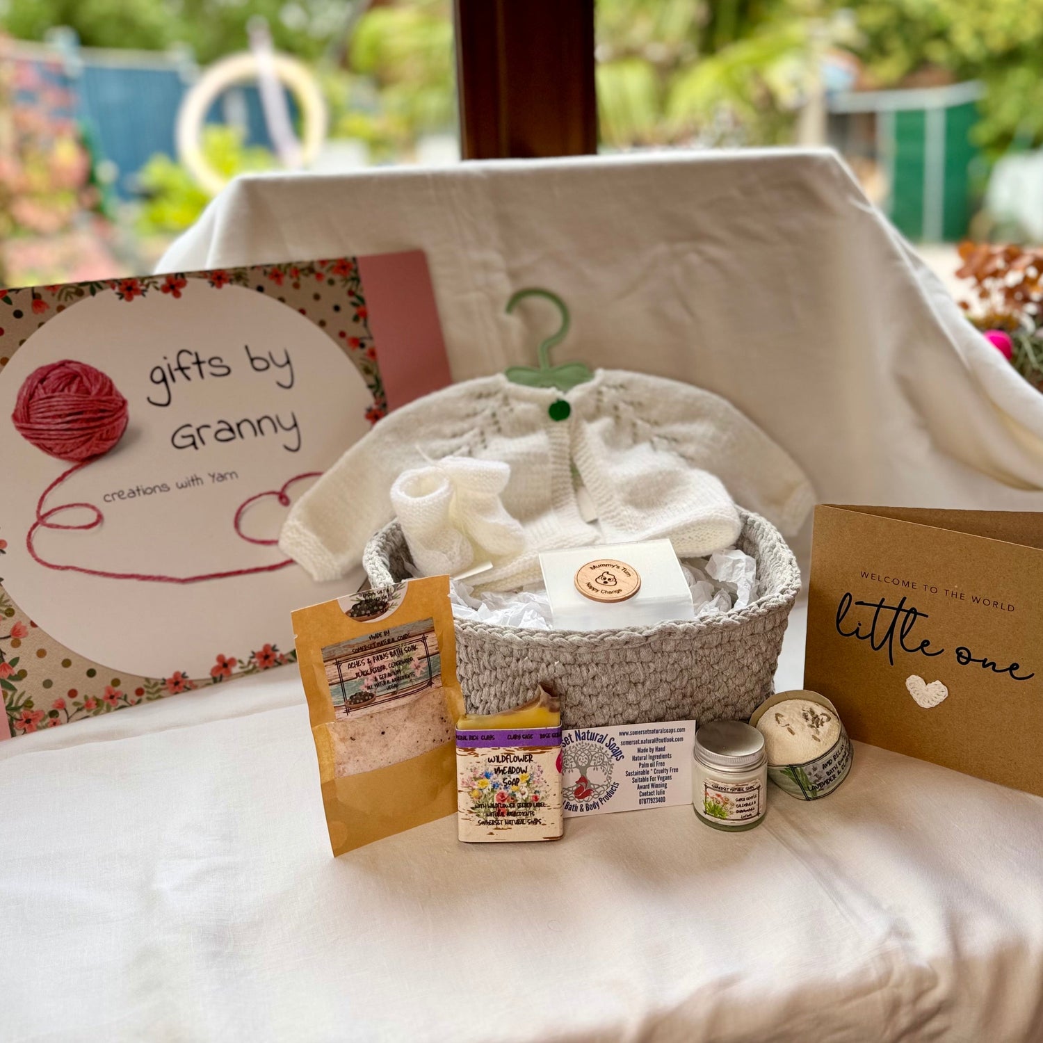 Handmade crochet gift basket with personalised keepsakes and thoughtful gifts, beautifully presented for a special occasion.